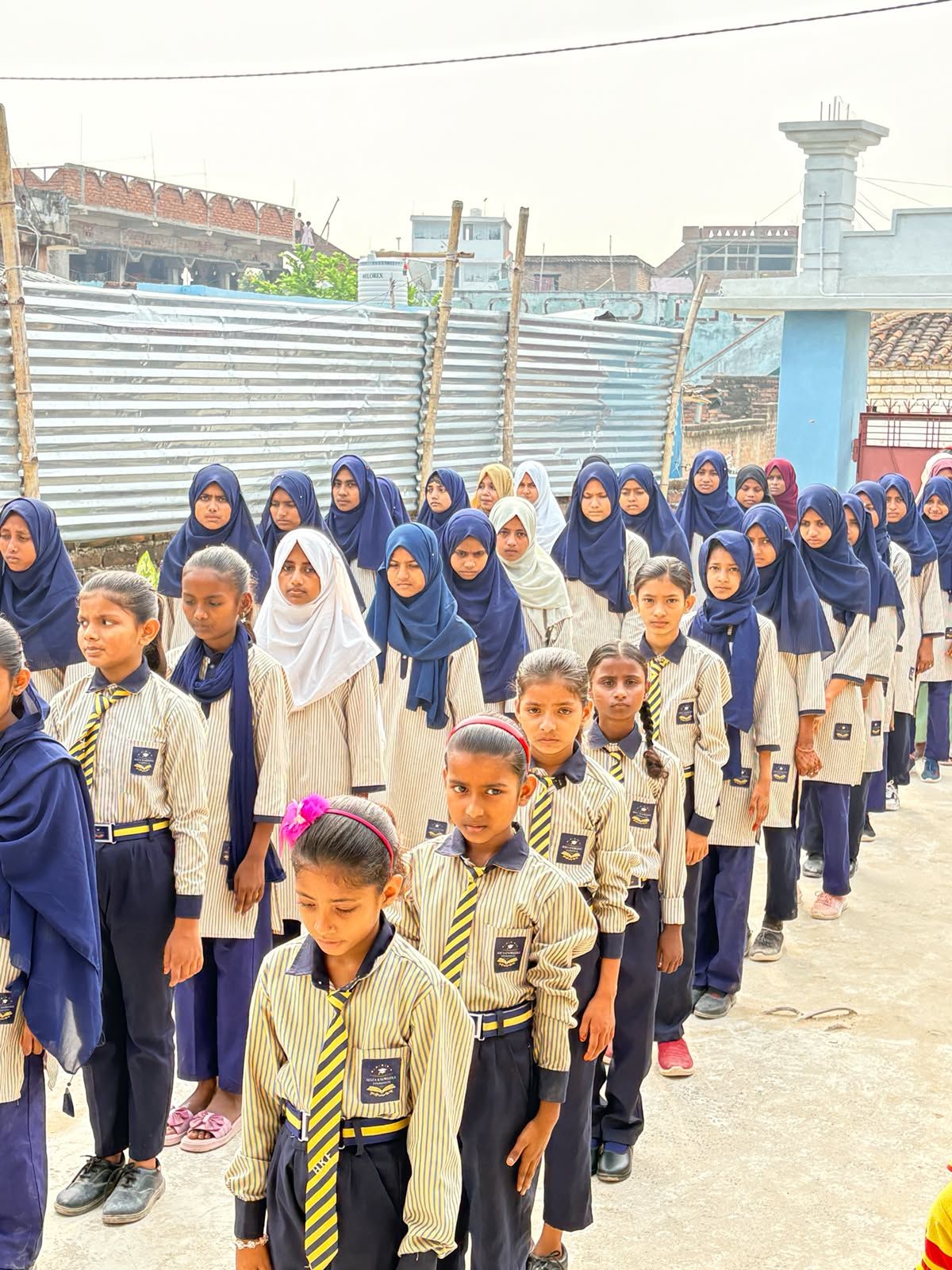 Students lined up for assembly at the Aliza Knowledge Foundation school